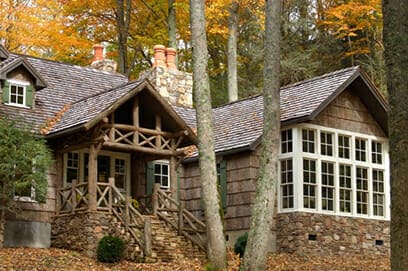 Exterior bark shingle siding on a residence in the autum