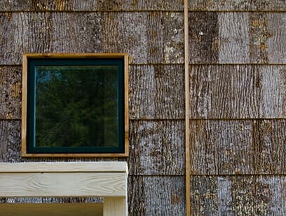 Reader & Swartz Camusrory: exterior tulip poplar bark shingle siding