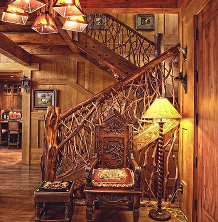 Architectural details: natural wood twigs and poles for an elegant rustic stairwell