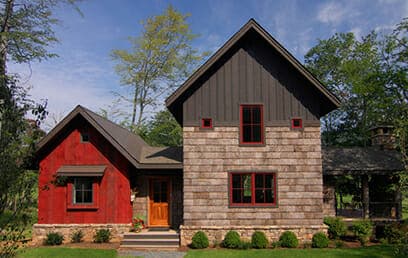 A Christopher Kellie Design house with tulip poplar exterior bark siding