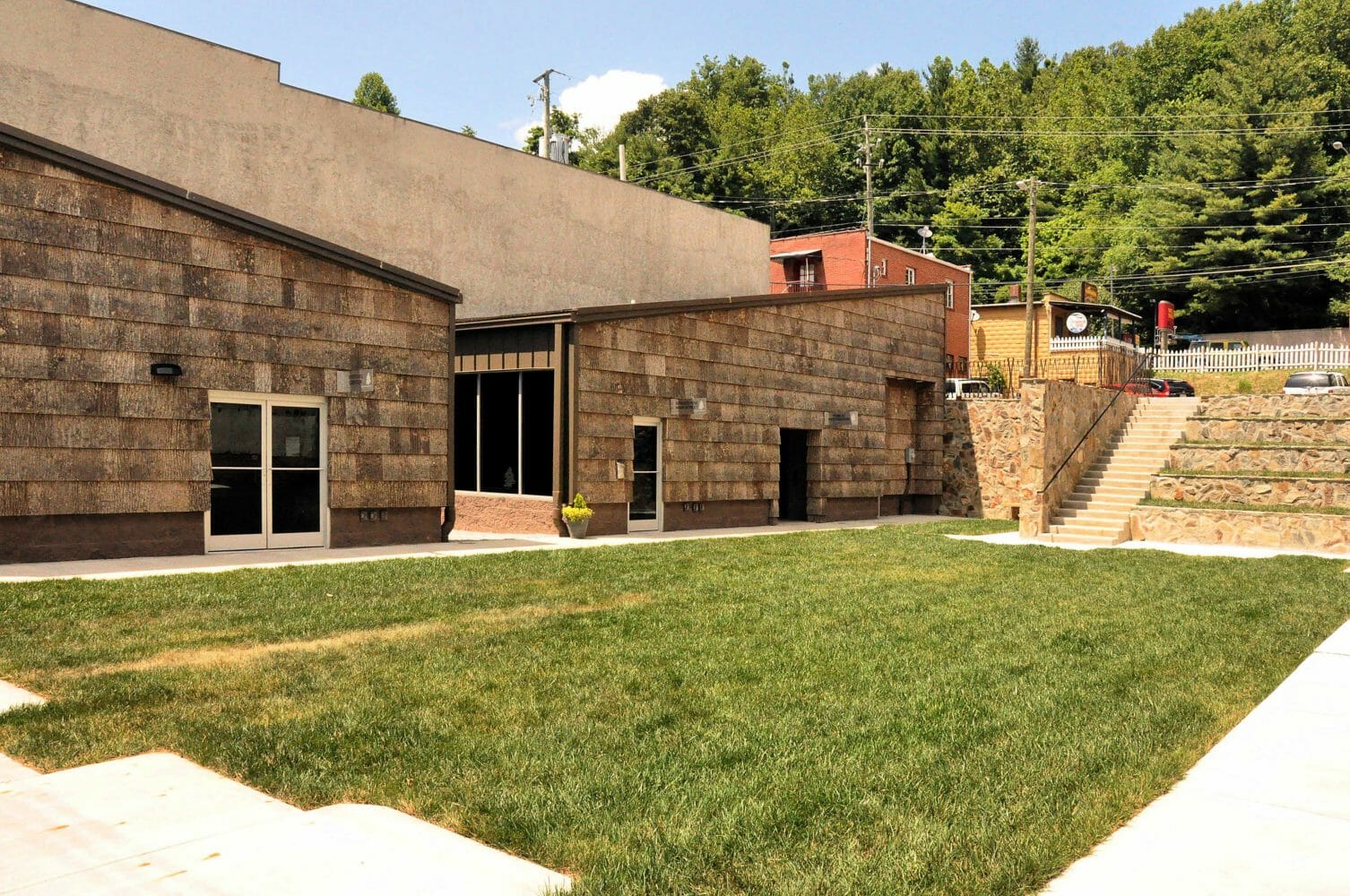 Spruce Pine Main Street Central Park Buildings with Poplar Bark Exterior Shingle Siding from The Bark House
