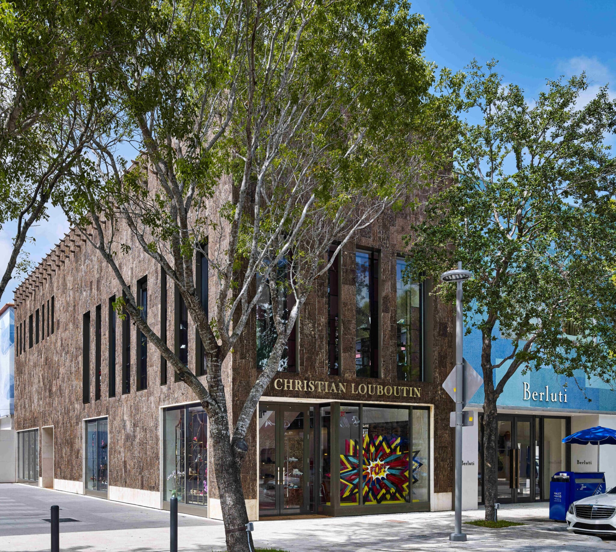 Louboutin's Miami luxury boutique is covered in Bark House tulip poplar bark siding
