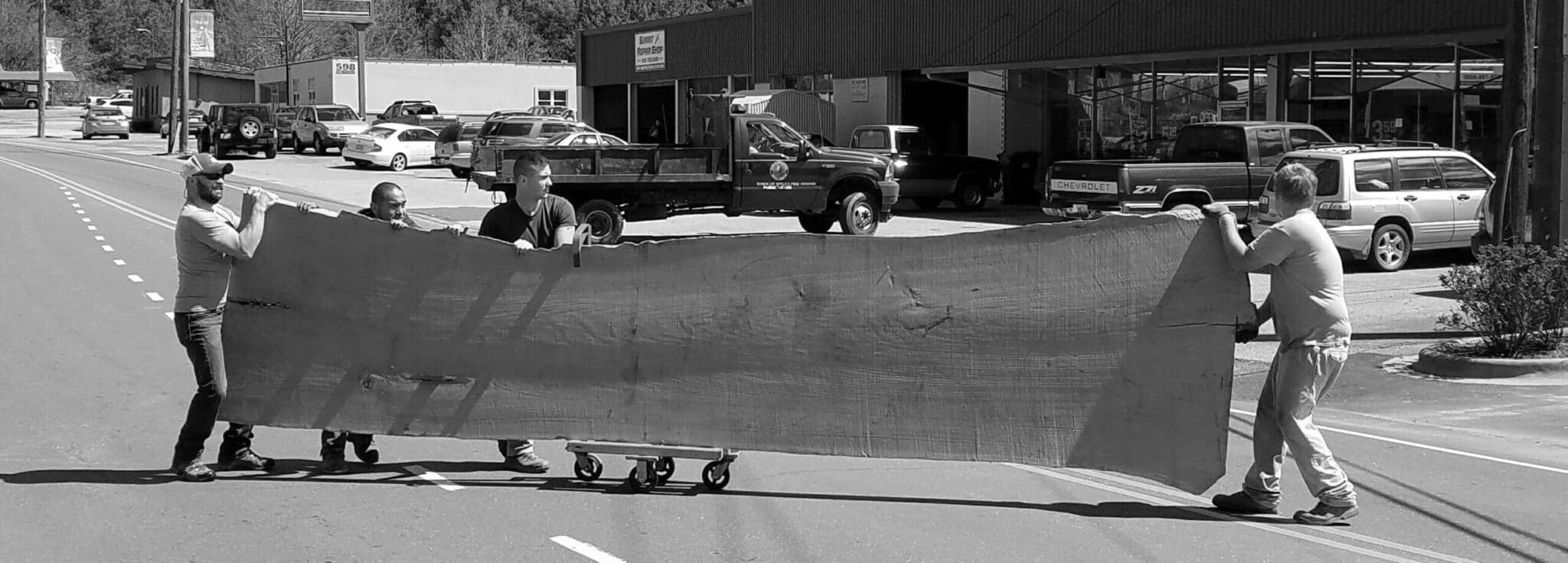 Bark House giant live edge wood slab crosses main street