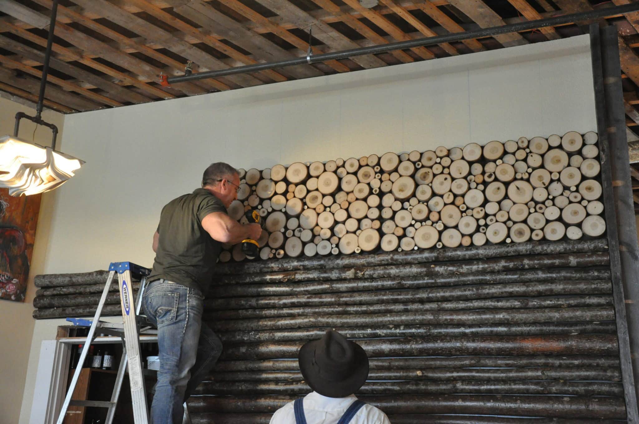 Bark House: Installing Poplar Pole End-Cuts Wall Panels (2x2) with poplar poles at Sppon Bar