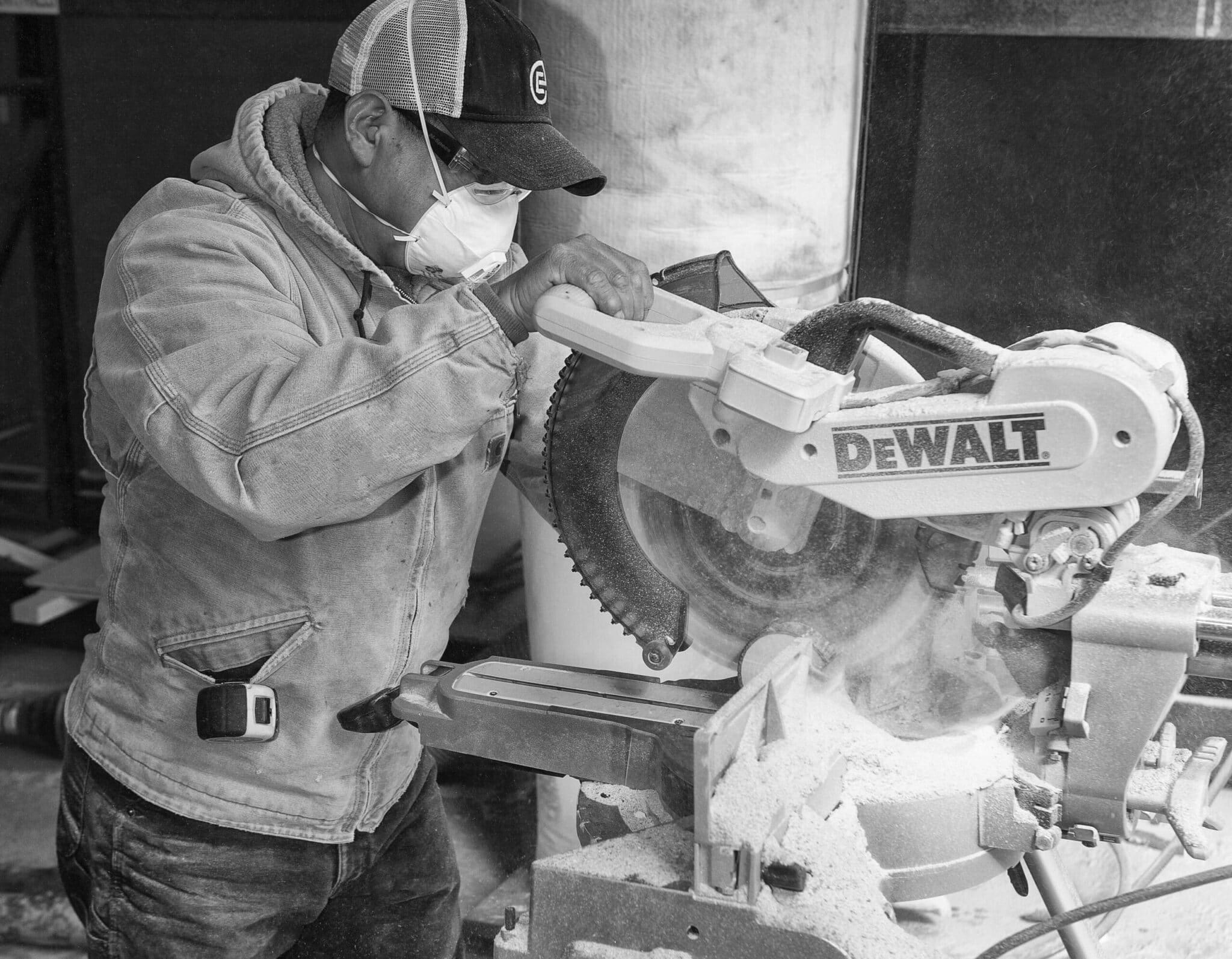 Bark house: cutting poplar poles for end cuts wall panels