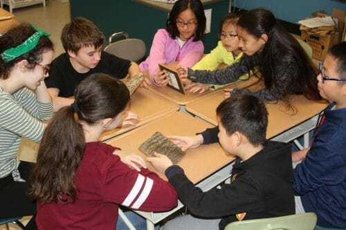 5th Grade students in Quincy, MA learn about eco-friendly building products by using Bark House Shingles.