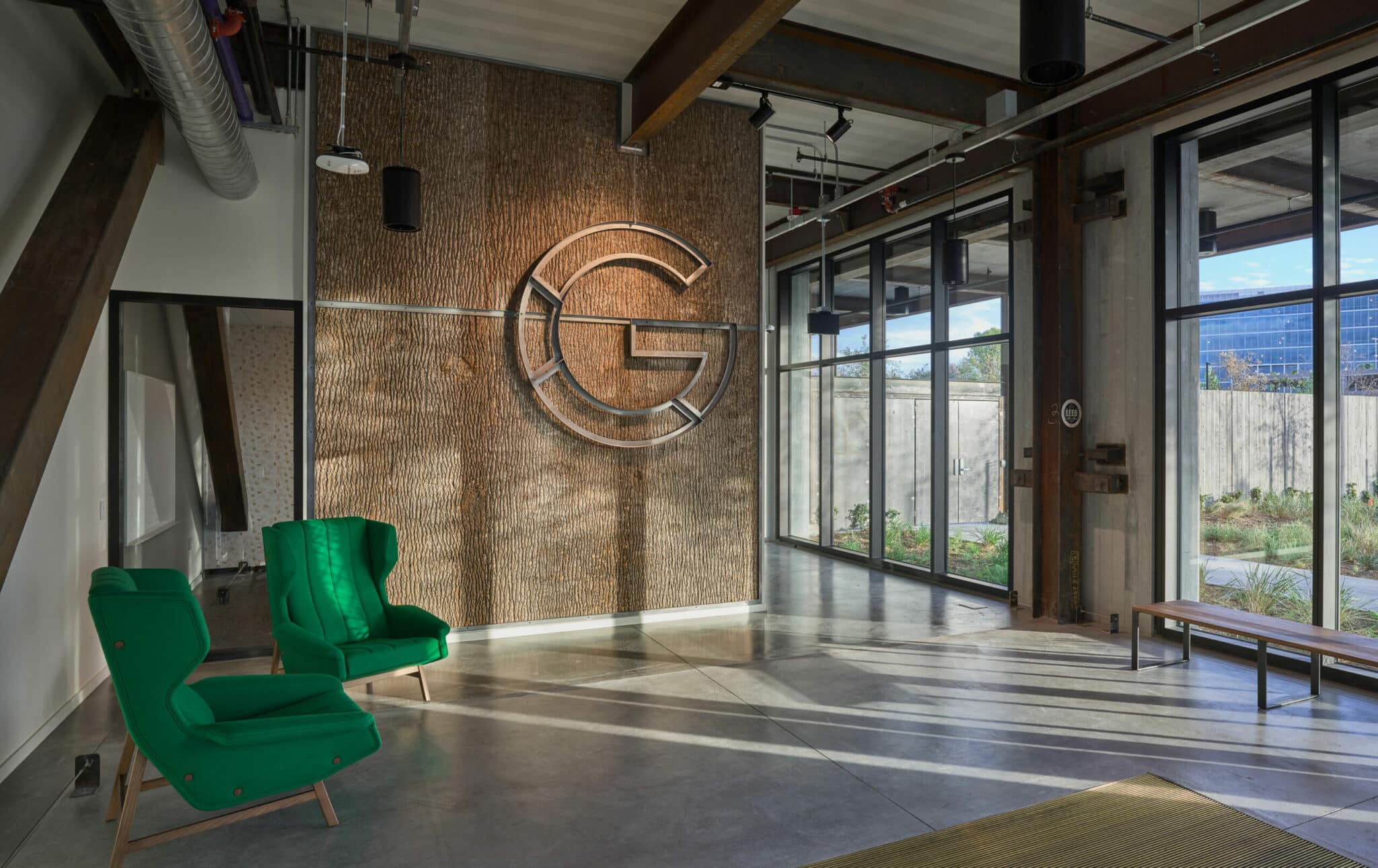 Photo by Prakash Patel Photography. Confidential Tech Company sports Bark House Interior Poplar Bark Panels.